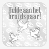 Huldeschild bruidspaar witte duiven